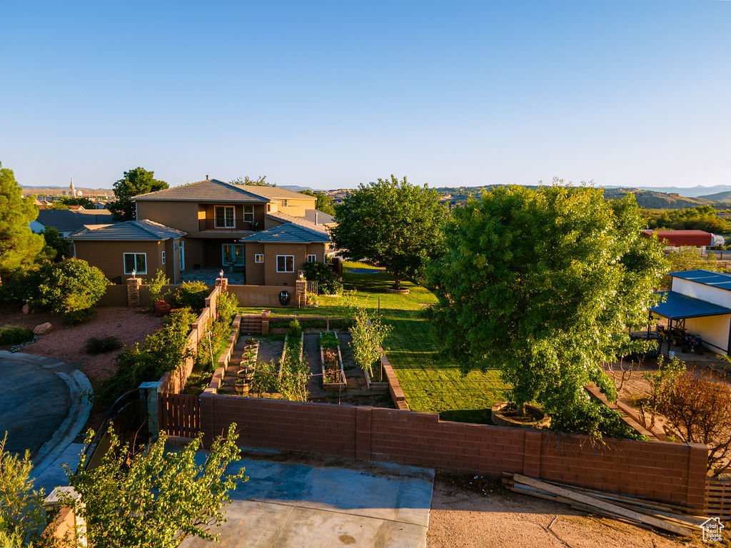 Rear view of property featuring a patio area