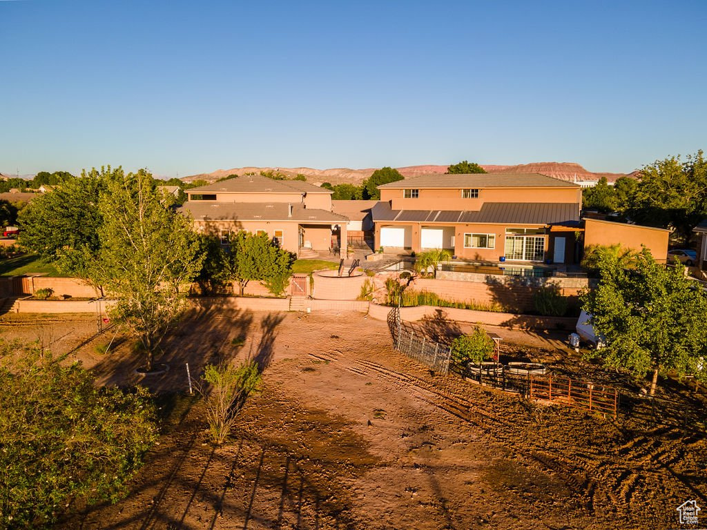 Rear view of house with a mountain view