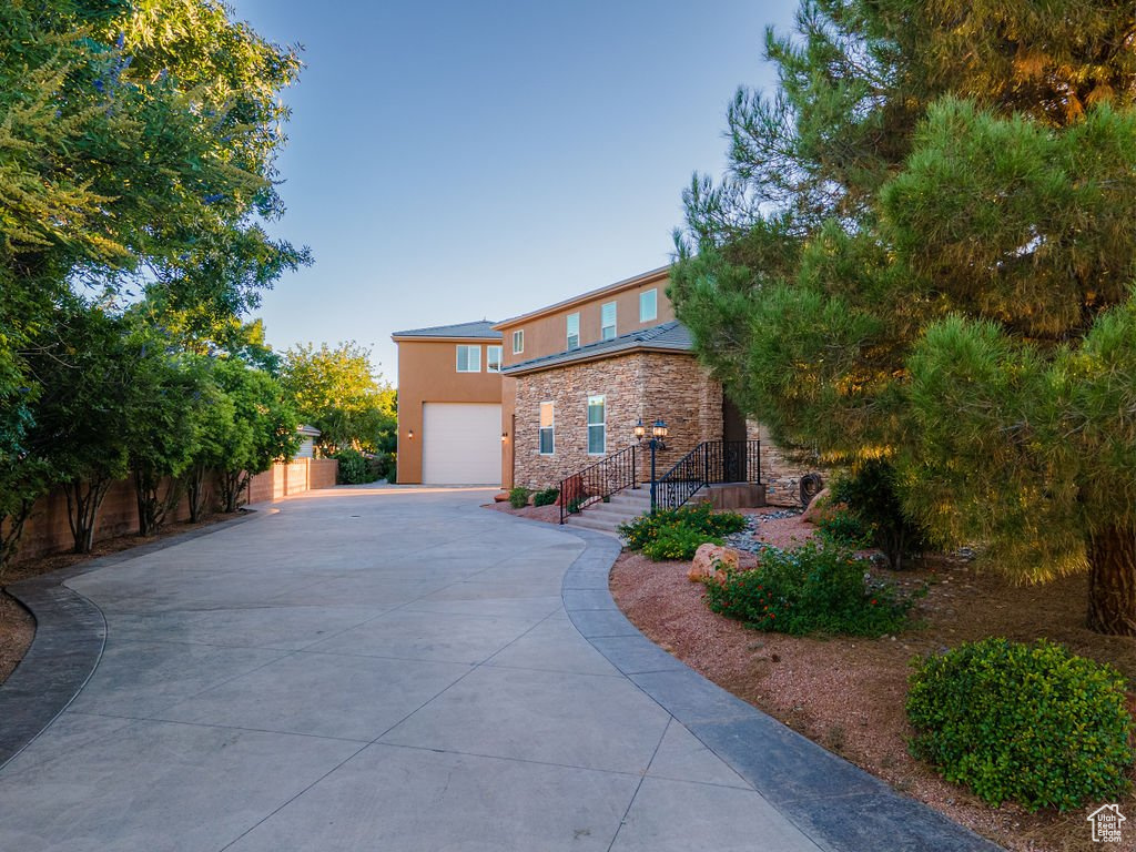 View of front of property with a garage