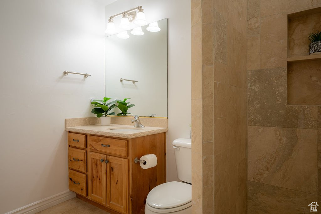 Bathroom with vanity and toilet