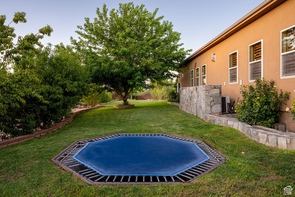 View of yard featuring cooling unit