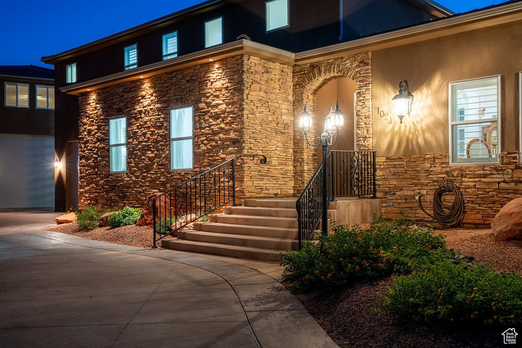 View of front of home featuring a garage