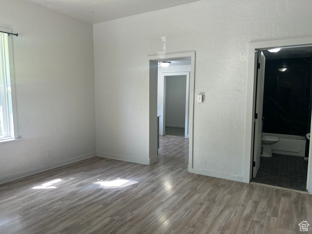 Empty room with light wood-type flooring