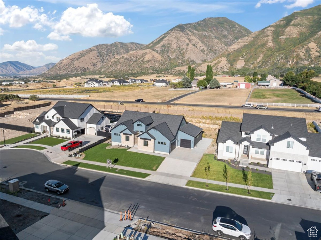 Birds eye view of property featuring a mountain view