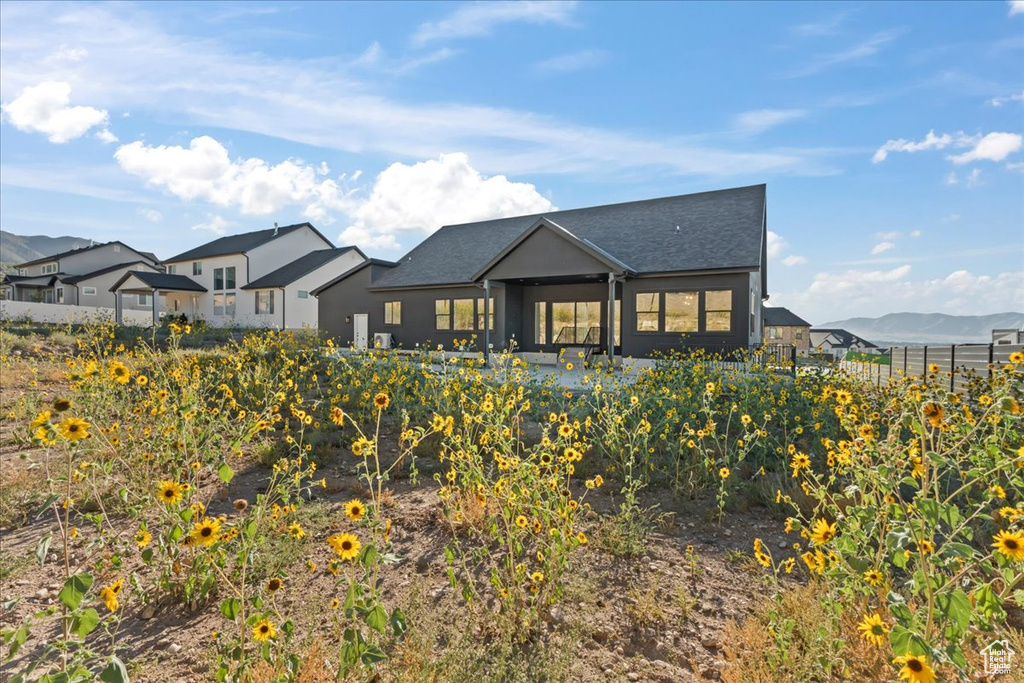 View of front of property featuring a mountain view