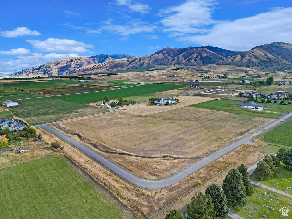 Drone / aerial view featuring a mountain view and a rural view