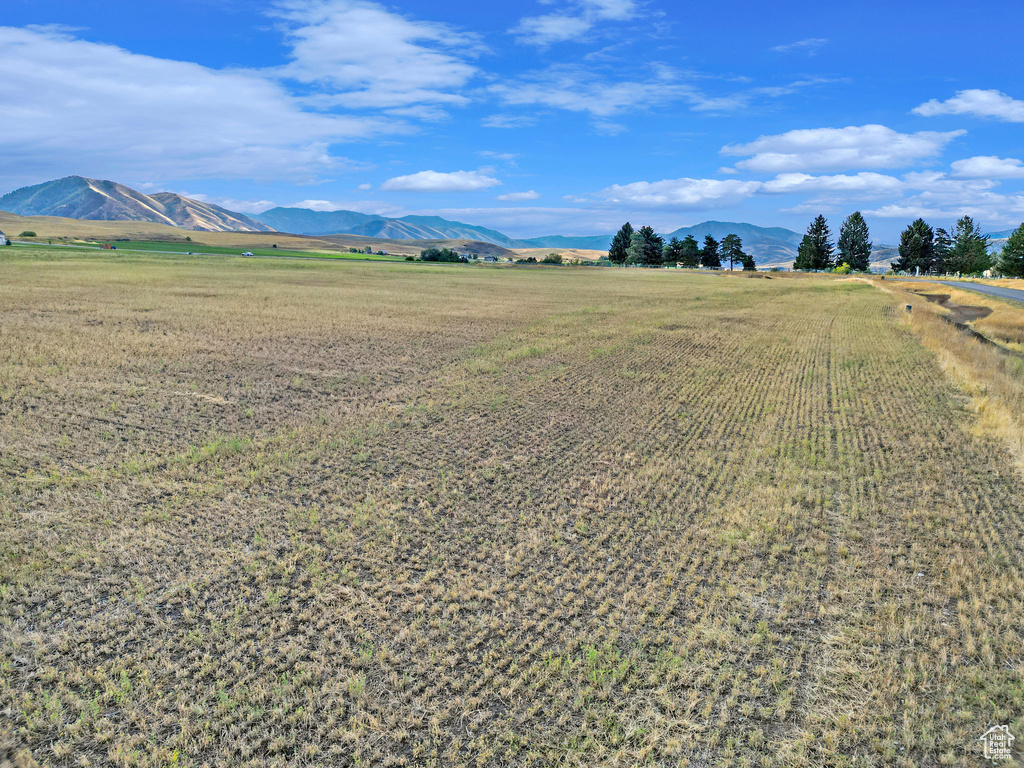 Exterior space featuring a rural view and a mountain view