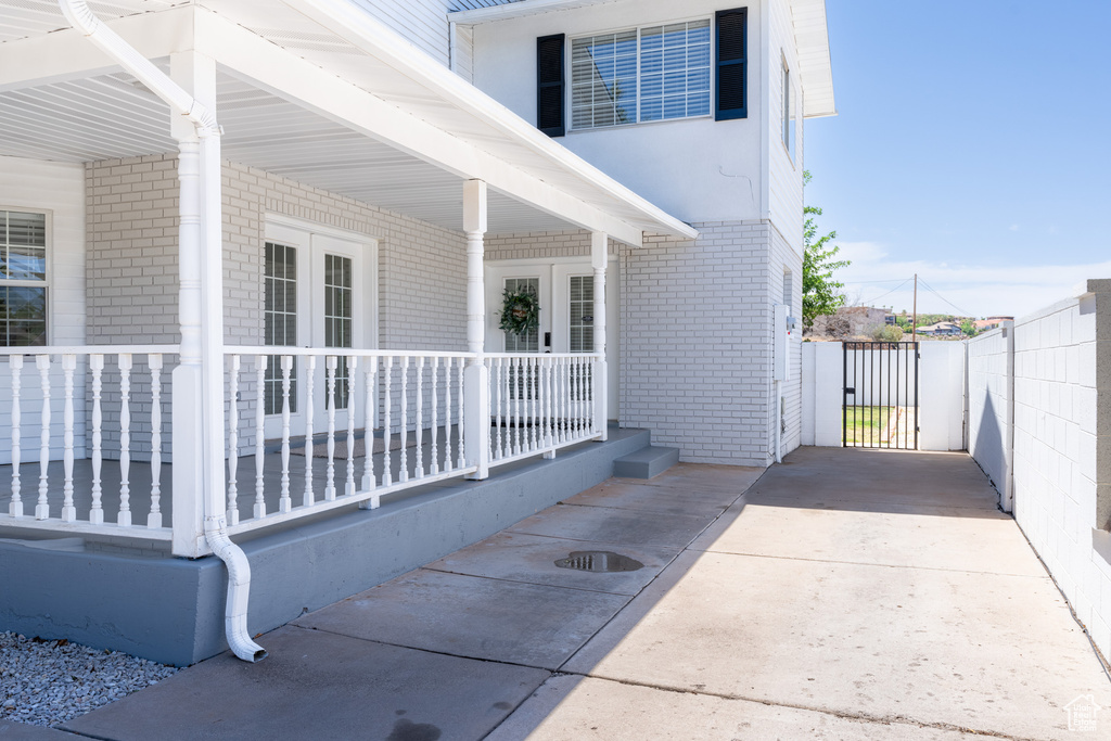 View of patio with covered porch