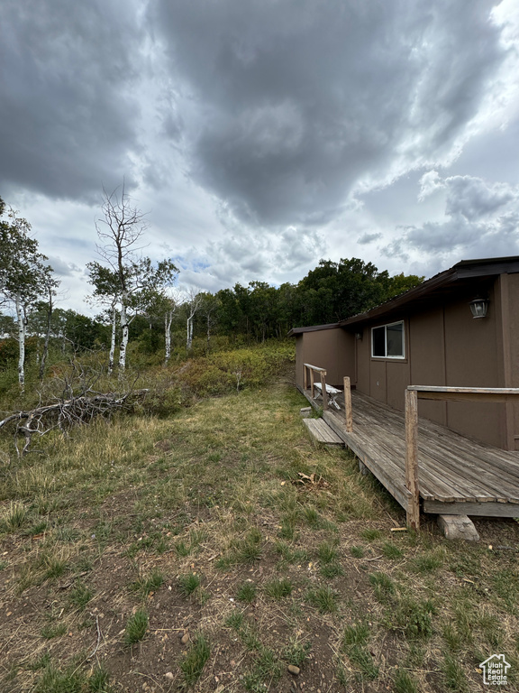 View of yard featuring a deck