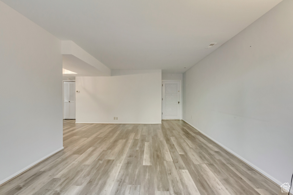 Empty room featuring light hardwood / wood-style flooring