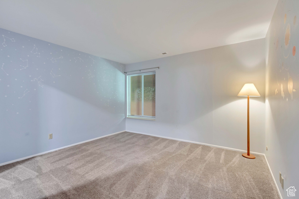 Spare room with carpet floors