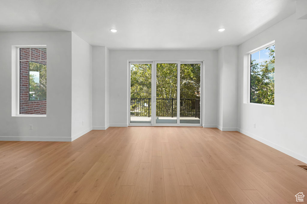 Empty room featuring light hardwood / wood-style flooring