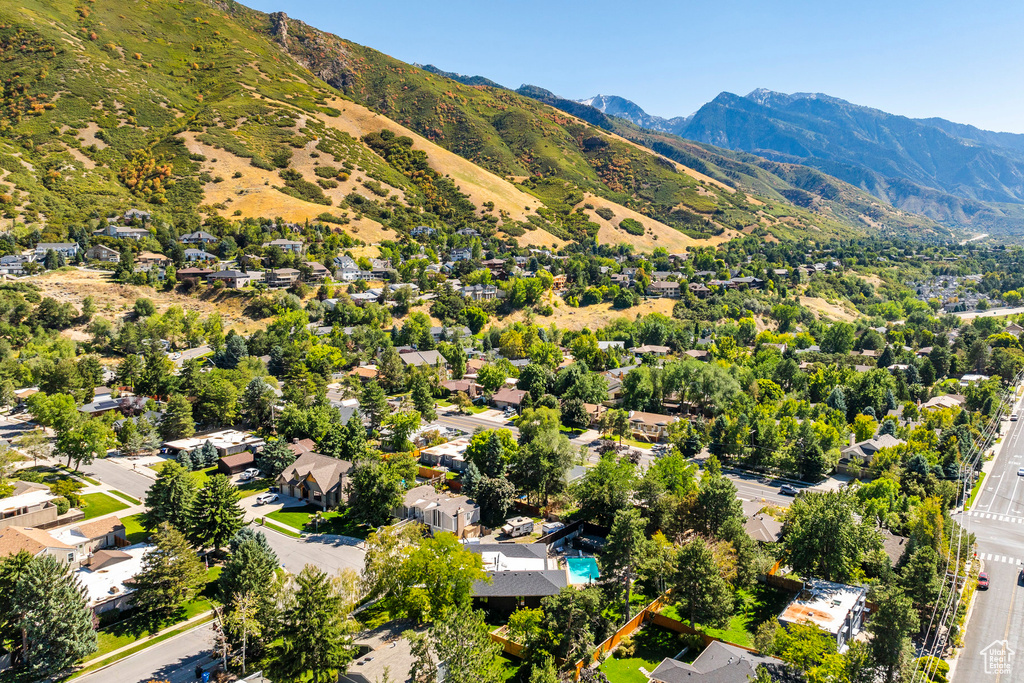 Birds eye view of property with a mountain view