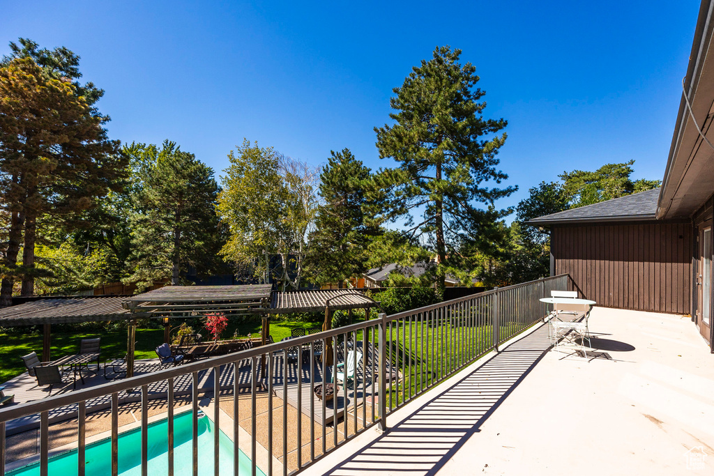 Balcony featuring a patio area