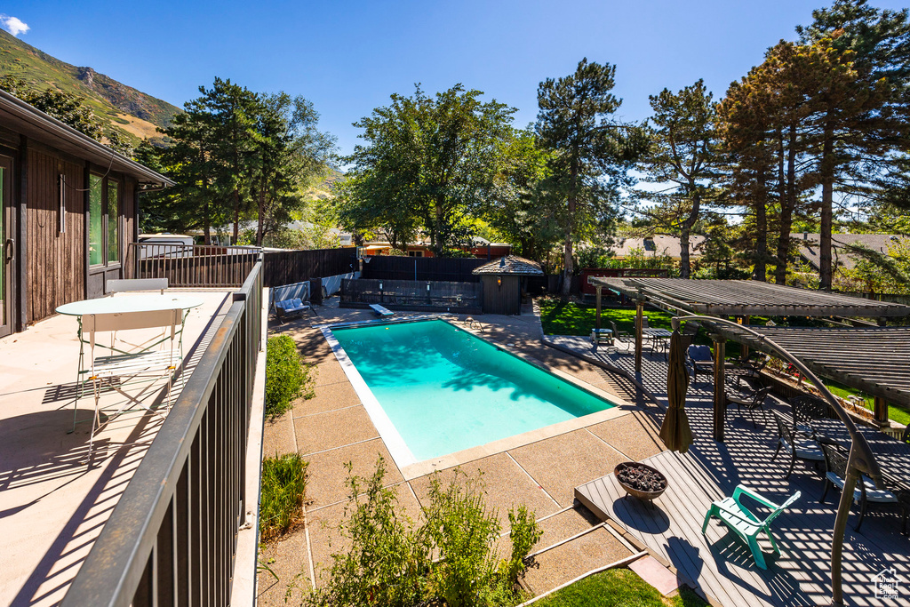 View of pool with a patio area