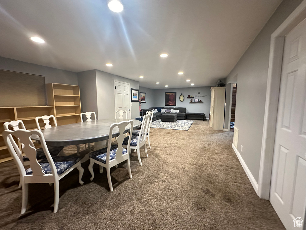 Dining area featuring carpet flooring