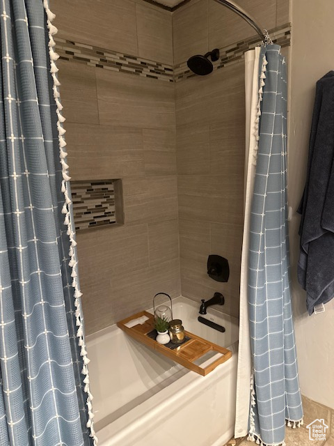 Bathroom featuring shower / tub combo