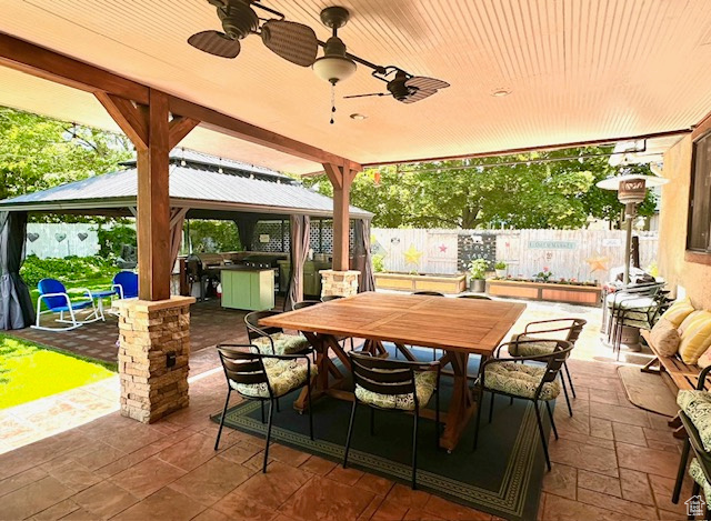 View of patio / terrace featuring a gazebo and ceiling fan