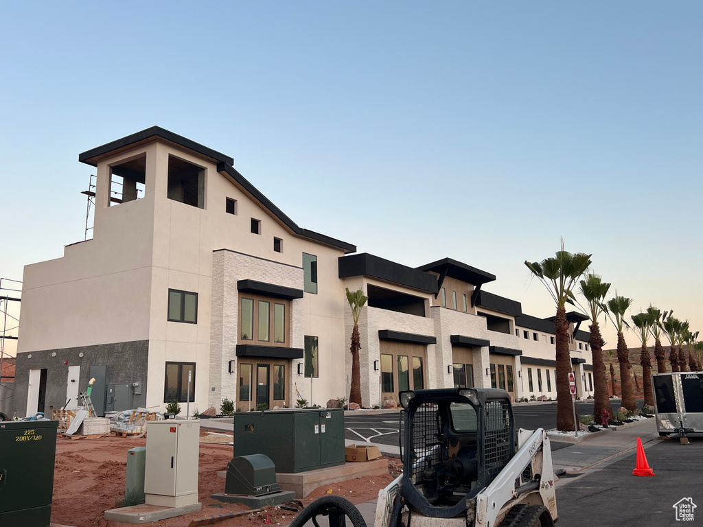 View of outdoor building at dusk