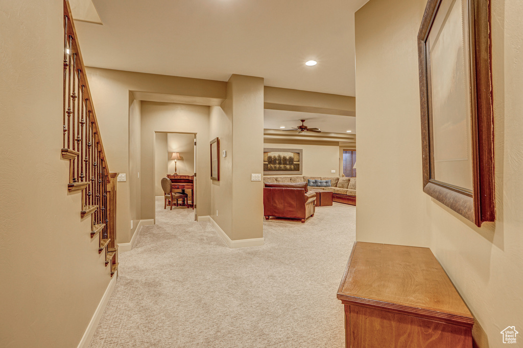 Hallway with light carpet