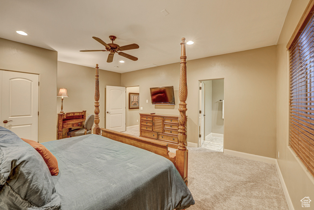 Bedroom with light carpet and ceiling fan