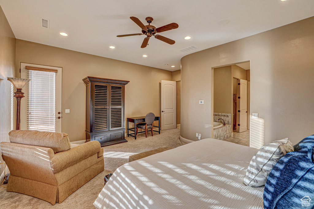 Bedroom featuring ceiling fan and light colored carpet