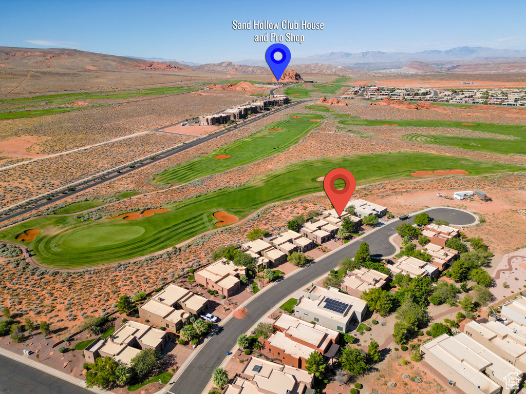 Birds eye view of property with a mountain view