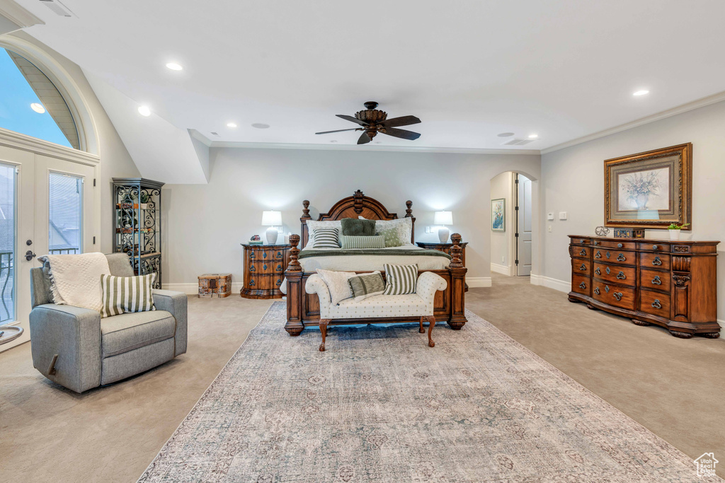 Bedroom with light colored carpet, access to outside, crown molding, ceiling fan, and french doors