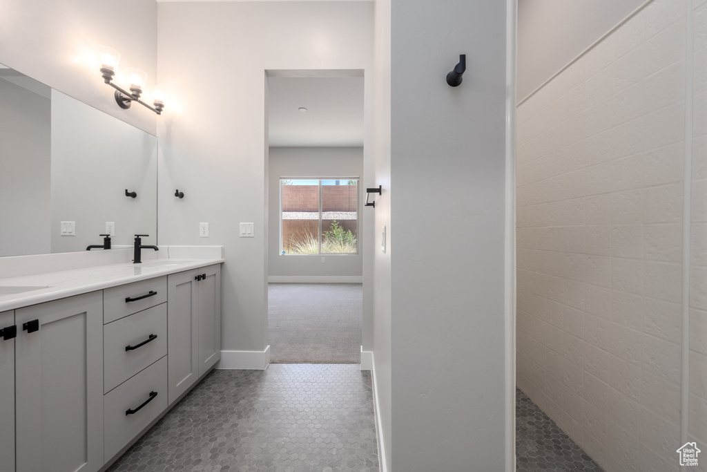 Bathroom with a shower and vanity