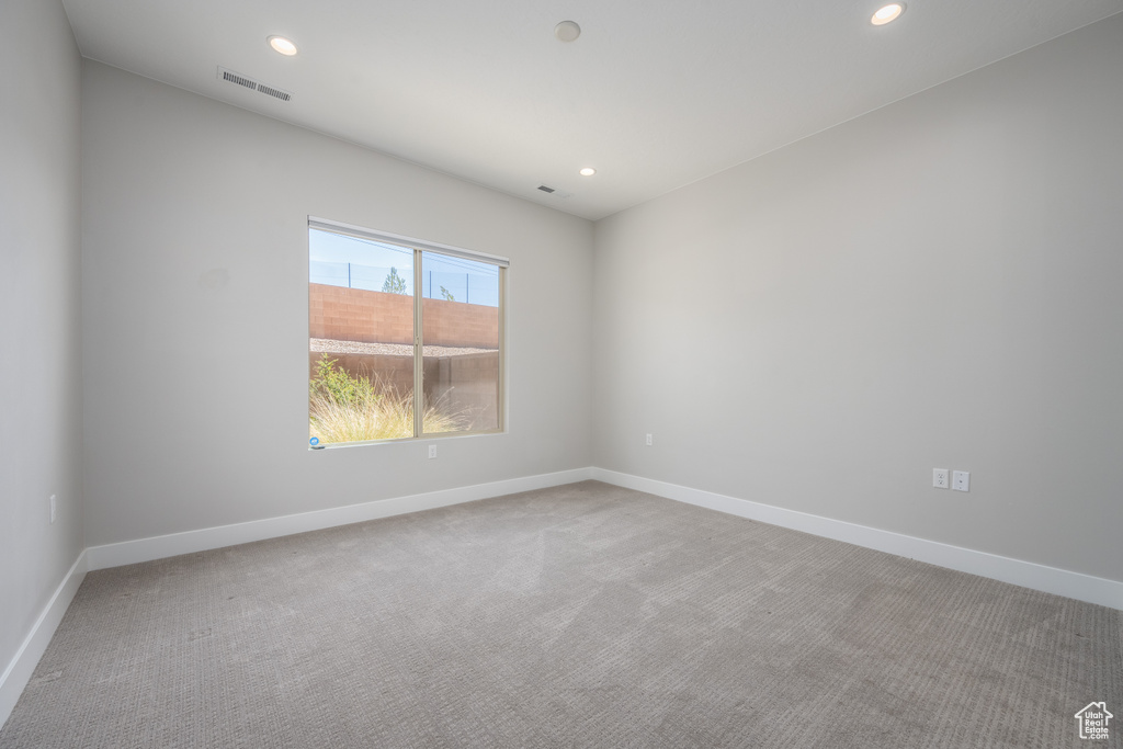 Spare room with carpet floors