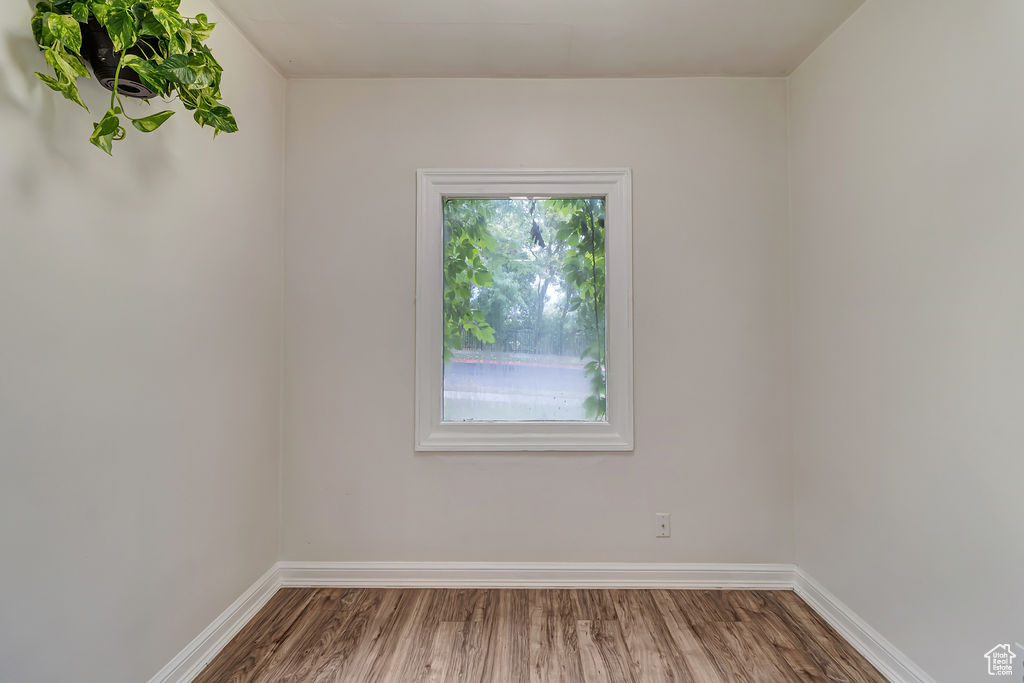 Unfurnished room featuring wood-type flooring