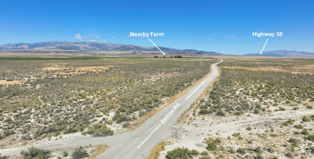 Drone / aerial view with a mountain view and a rural view