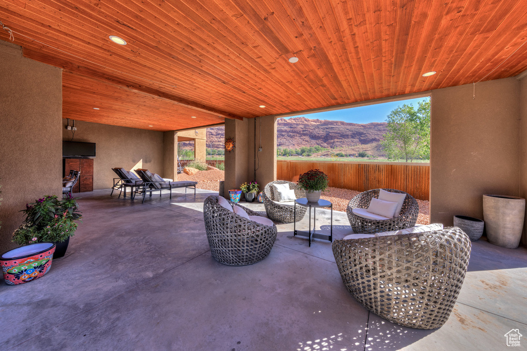View of patio / terrace with outdoor lounge area and a mountain view