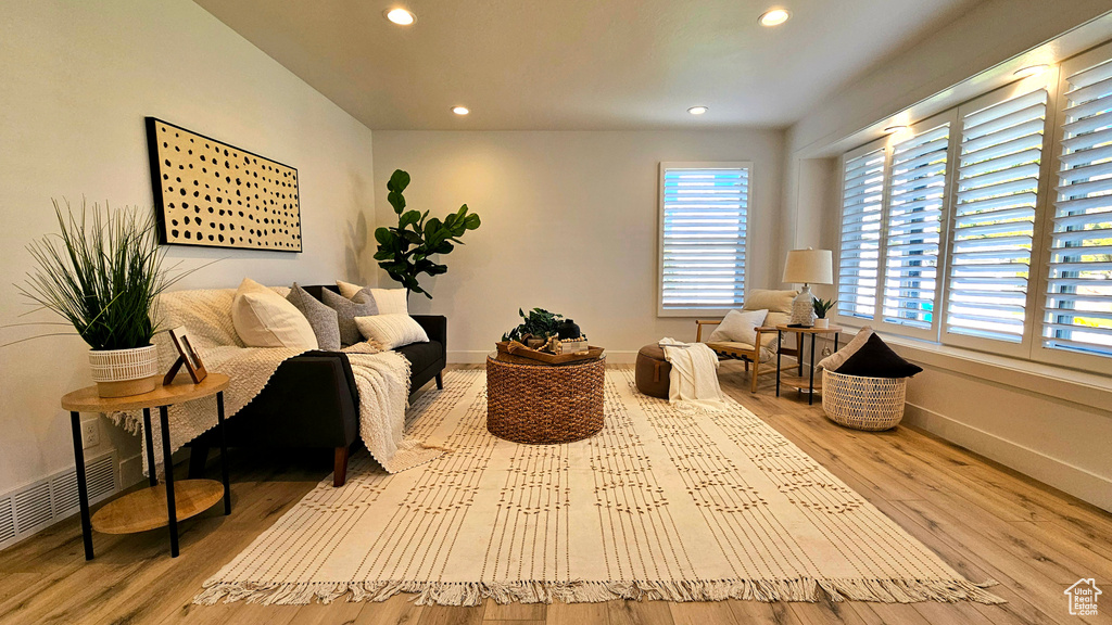 Sitting room featuring light hardwood / wood-style flooring and a wealth of natural light