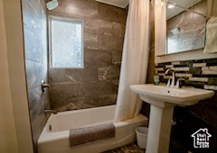 Bathroom with shower / tub combo