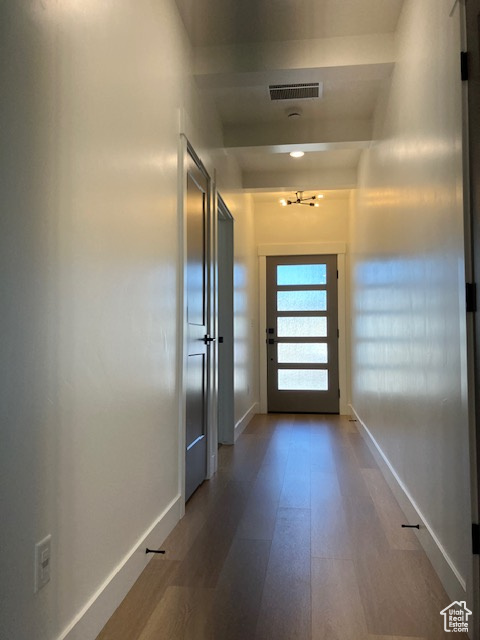 Doorway to outside with hardwood / wood-style flooring