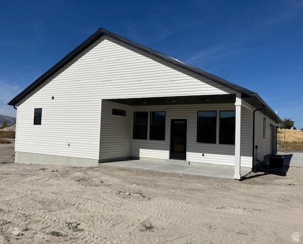 Back of property featuring a patio area