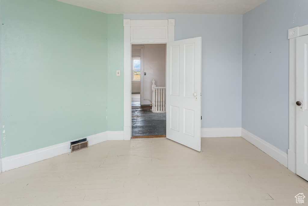 Spare room with light wood-type flooring