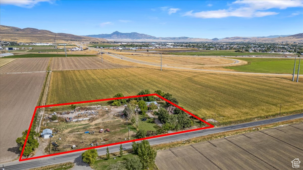 Birds eye view of property featuring a rural view and a mountain view