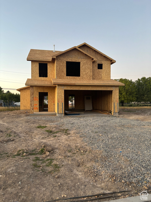 View of front of house featuring a carport