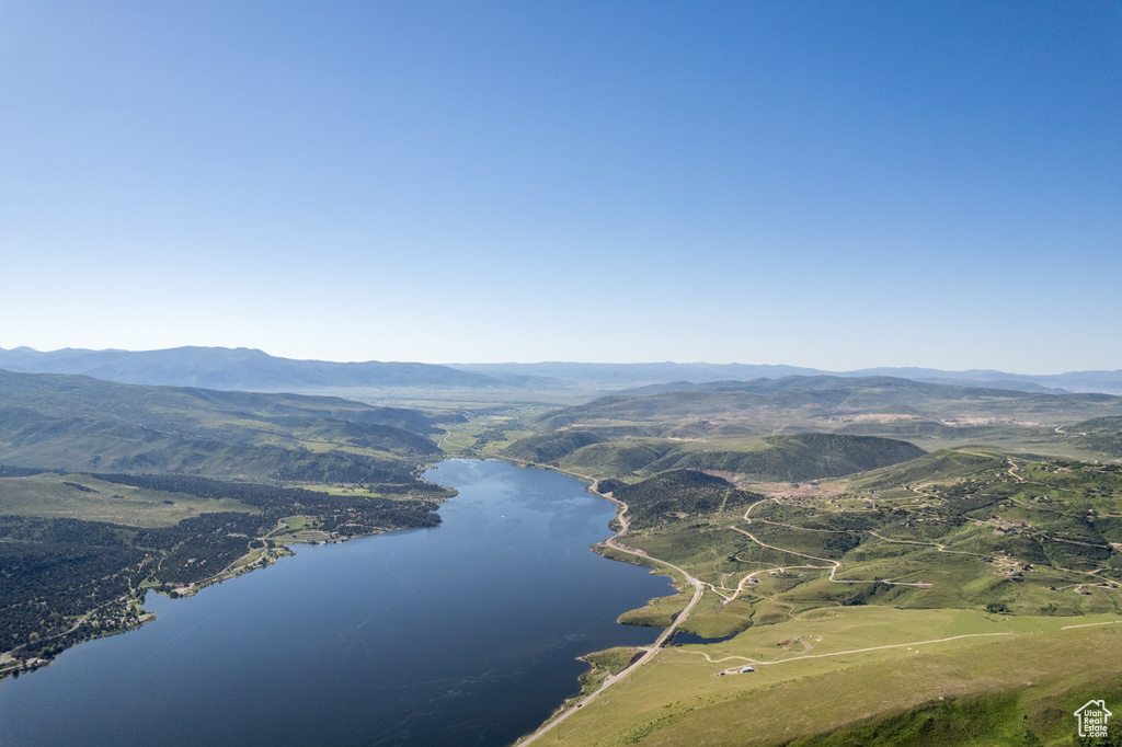 Bird\'s eye view with a water and mountain view