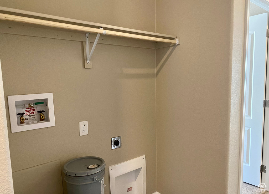 Laundry area featuring washer hookup and electric dryer hookup