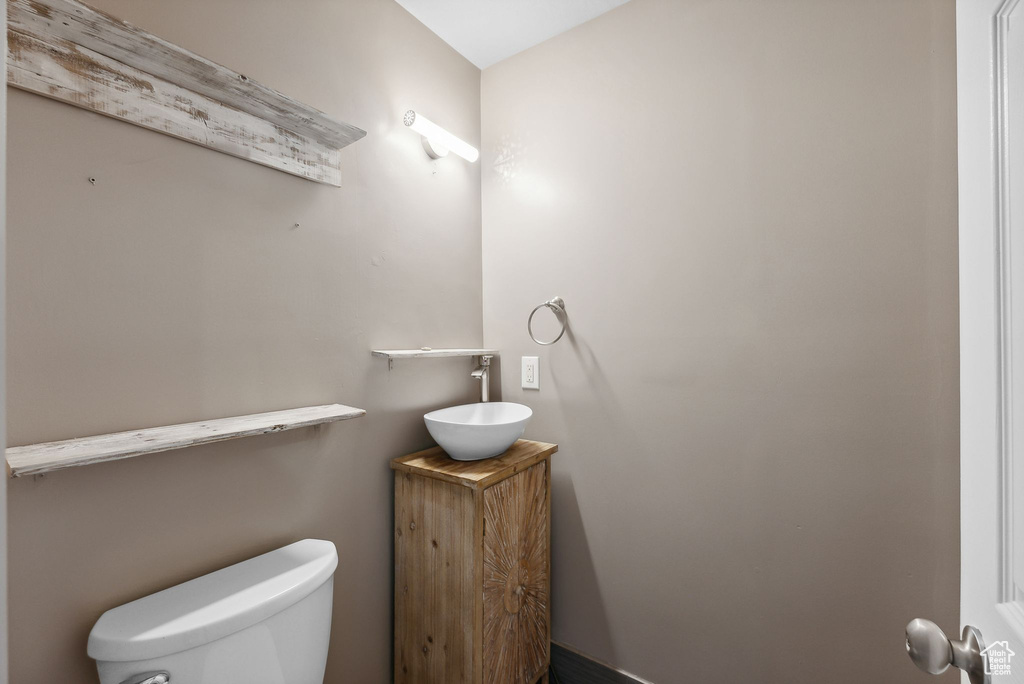 Bathroom with vanity and toilet