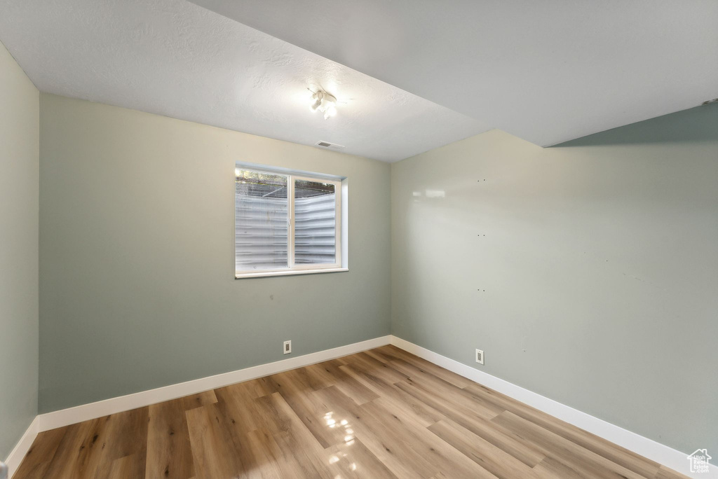 Unfurnished room featuring light hardwood / wood-style floors