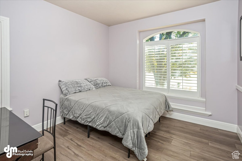 Bedroom featuring hardwood / wood-style flooring