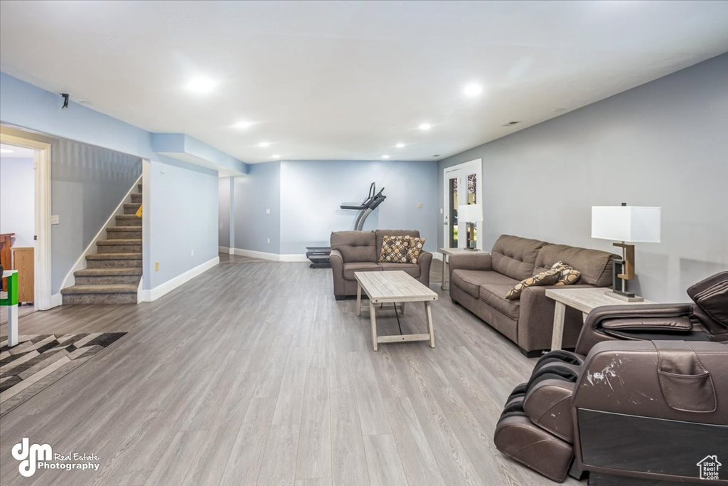 Living room with light wood-type flooring