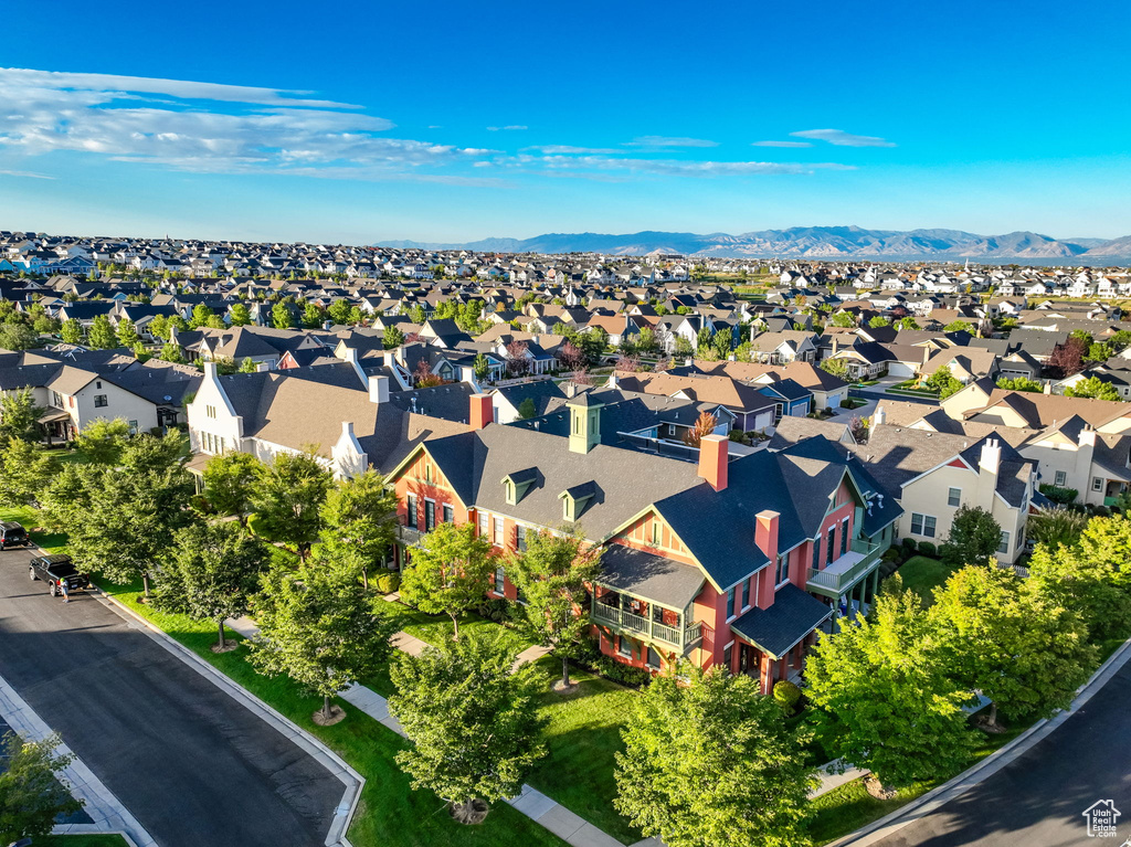 Birds eye view of property with a mountain view