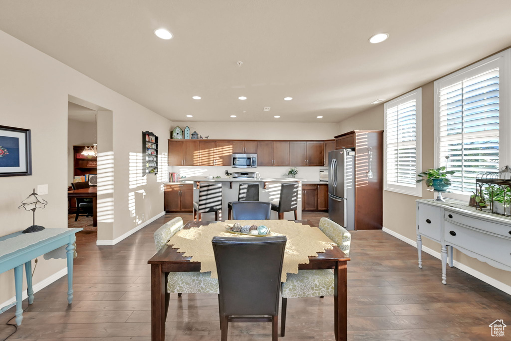 Dining area featuring dark hardwood / wood-style flooring