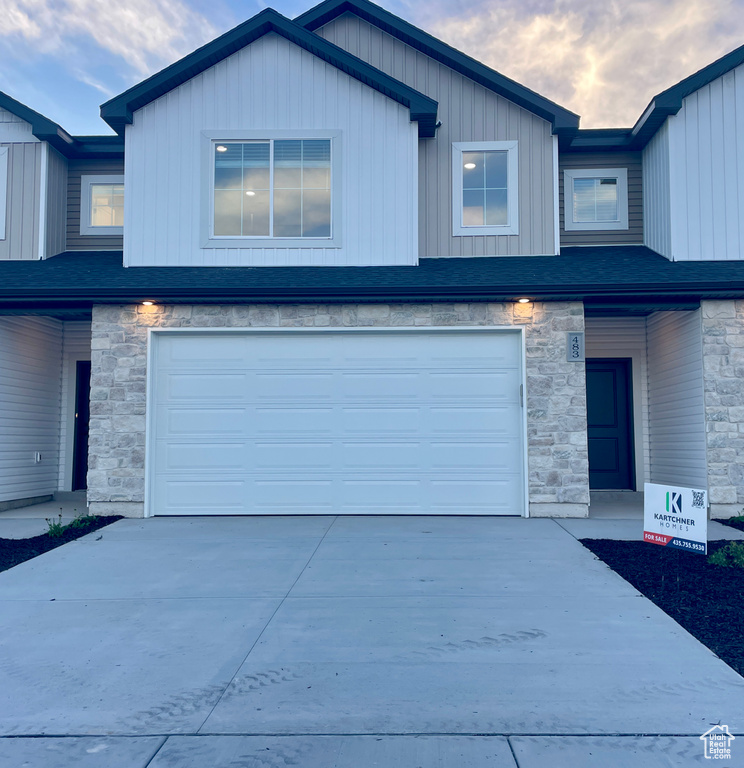 View of front of house with a garage