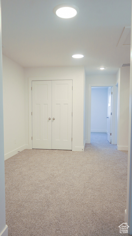 Interior space with light colored carpet